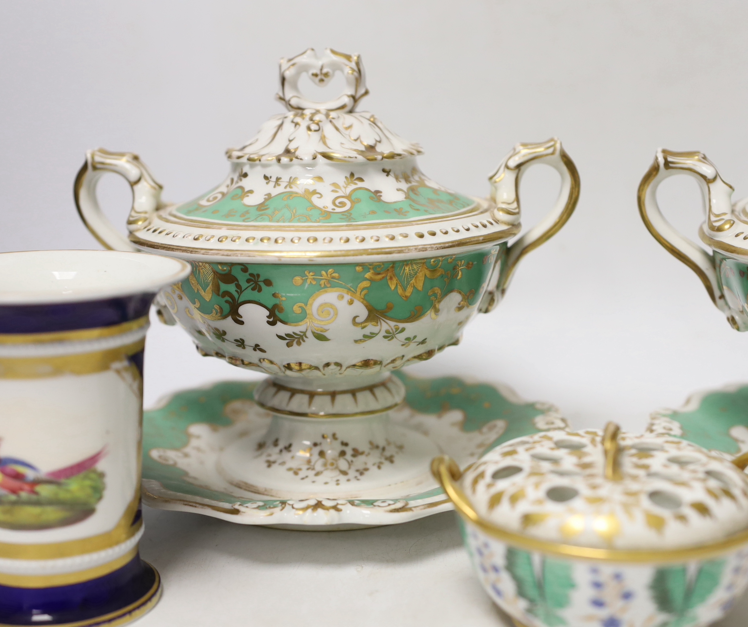 Early 19th century English porcelain including a Wedgwood pot pourri bowl and cover, two sauce tureens covers with integral stands, a butterfly painted trio and a bird painted spill vase